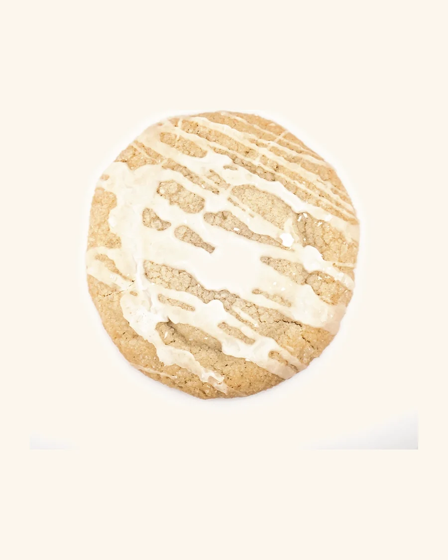 A big golden sugar cookie finished with a sweet vanilla drizzle